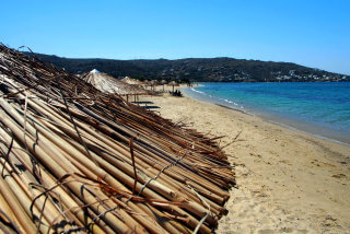 Bamboo umbrellas in plaka beach